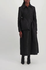 Fitted black coat with asymmetric side panels
